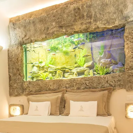 Üdülőközpont La Corte Dell'astore - Trulli Diffusi Nel Centro Storico Di 3*