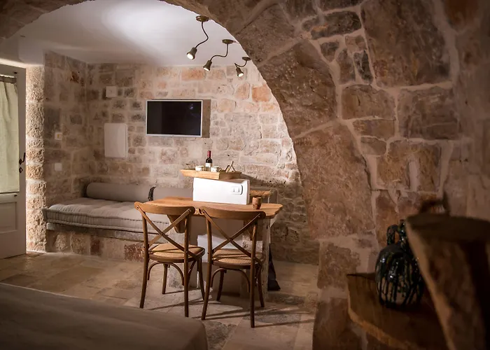 리조트 La Corte Dell'astore - Trulli Diffusi Nel Centro Storico Di 3*